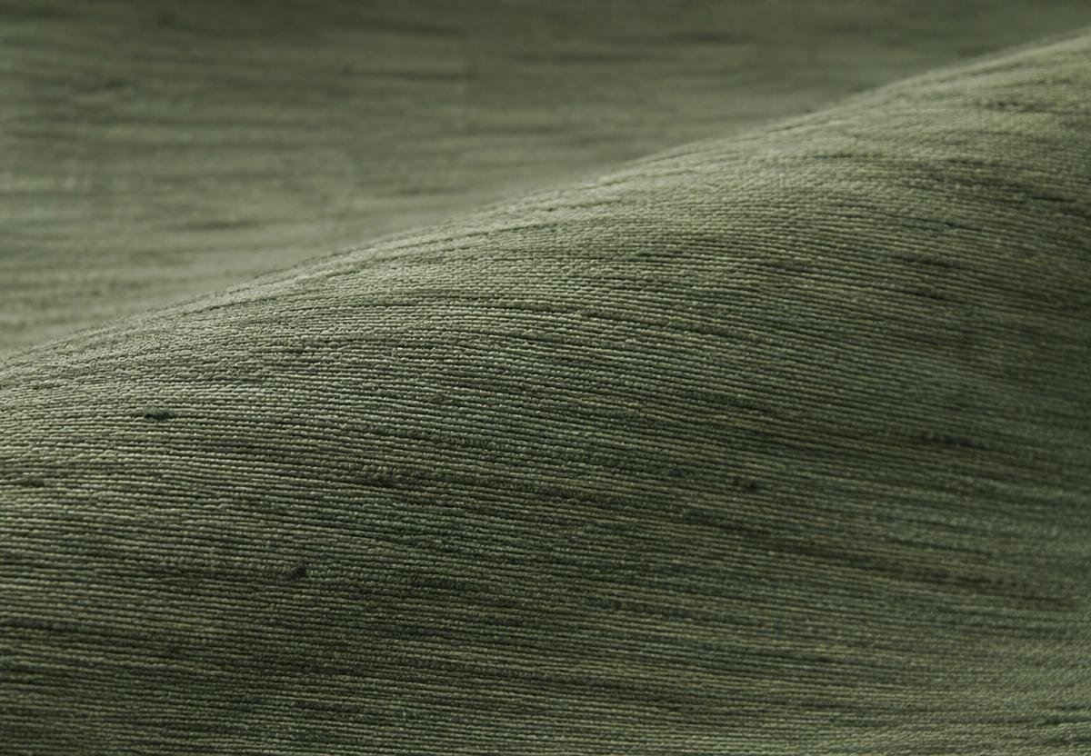 Close view of Aura's grasscloth material